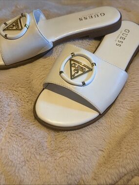 GUESS White Slide Mules with Gold Triangle Logo